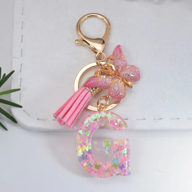 Pink Glitter Initial With Butterfly Charm Keyrings
