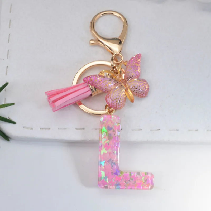 Pink Glitter Initial With Butterfly Charm Keyrings