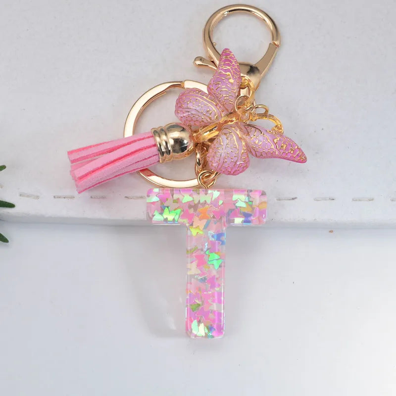 Pink Glitter Initial With Butterfly Charm Keyrings