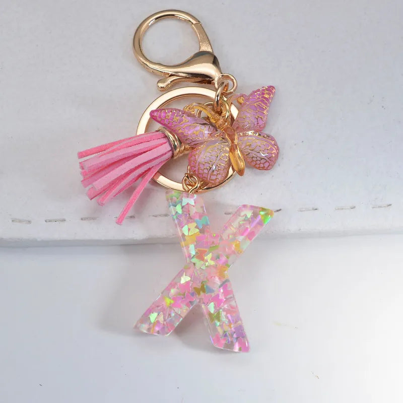 Pink Glitter Initial With Butterfly Charm Keyrings