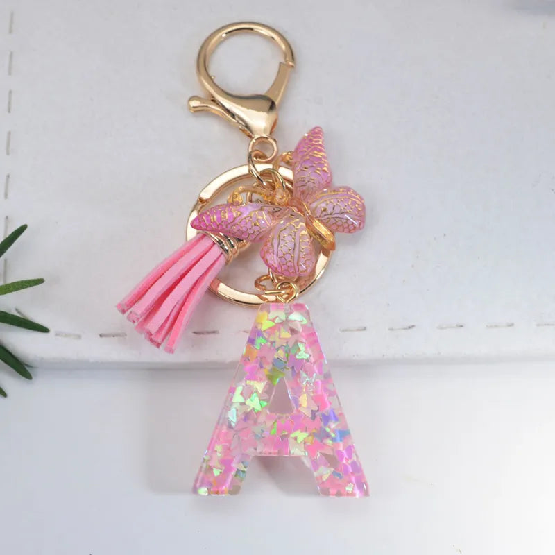 Pink Glitter Initial With Butterfly Charm Keyrings