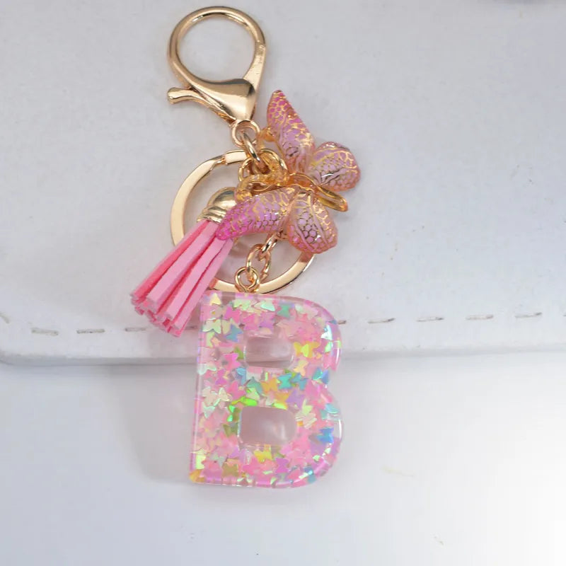 Pink Glitter Initial With Butterfly Charm Keyrings