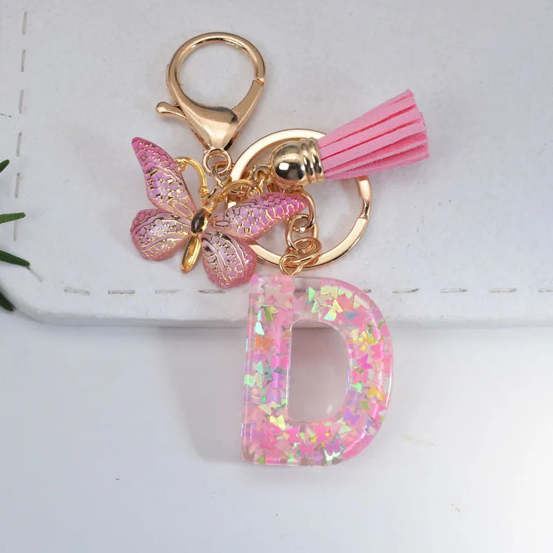 Pink Glitter Initial With Butterfly Charm Keyrings
