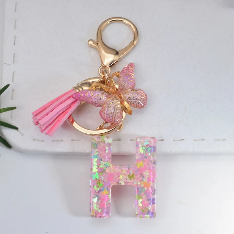 Pink Glitter Initial With Butterfly Charm Keyrings