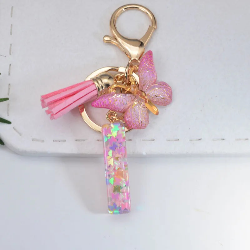 Pink Glitter Initial With Butterfly Charm Keyrings
