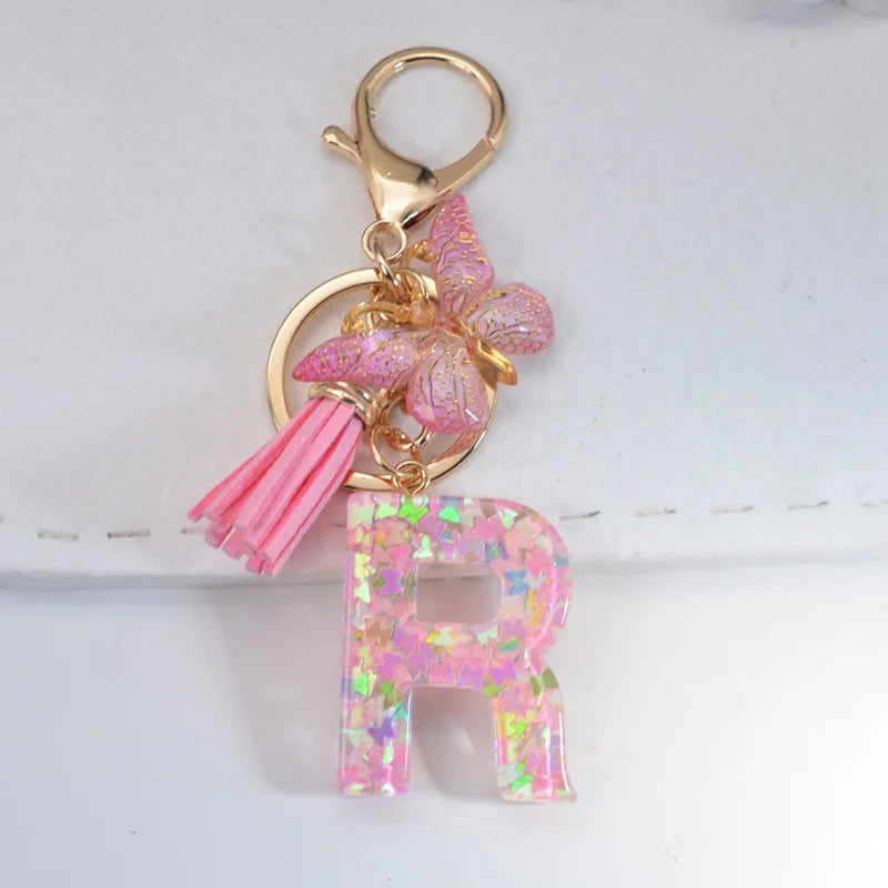 Pink Glitter Initial With Butterfly Charm Keyrings