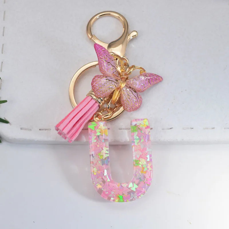 Pink Glitter Initial With Butterfly Charm Keyrings